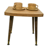 Side table with compass legs