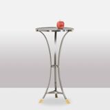 “Canabas” pedestal table in patinated leather, steel, and gilded brass. Contemporary. LS59502209H