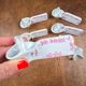 Set of 6 vintage porcelain knife rests with name markers, basket shape.