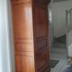 Man standing in cherry wood perfect condition like new
