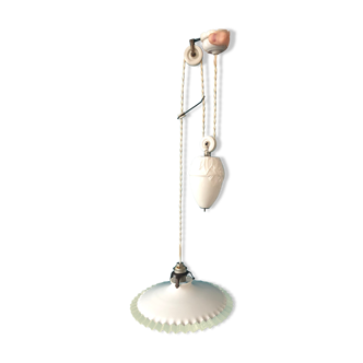 Hanging lamp rises and falls in porcelain and opaline