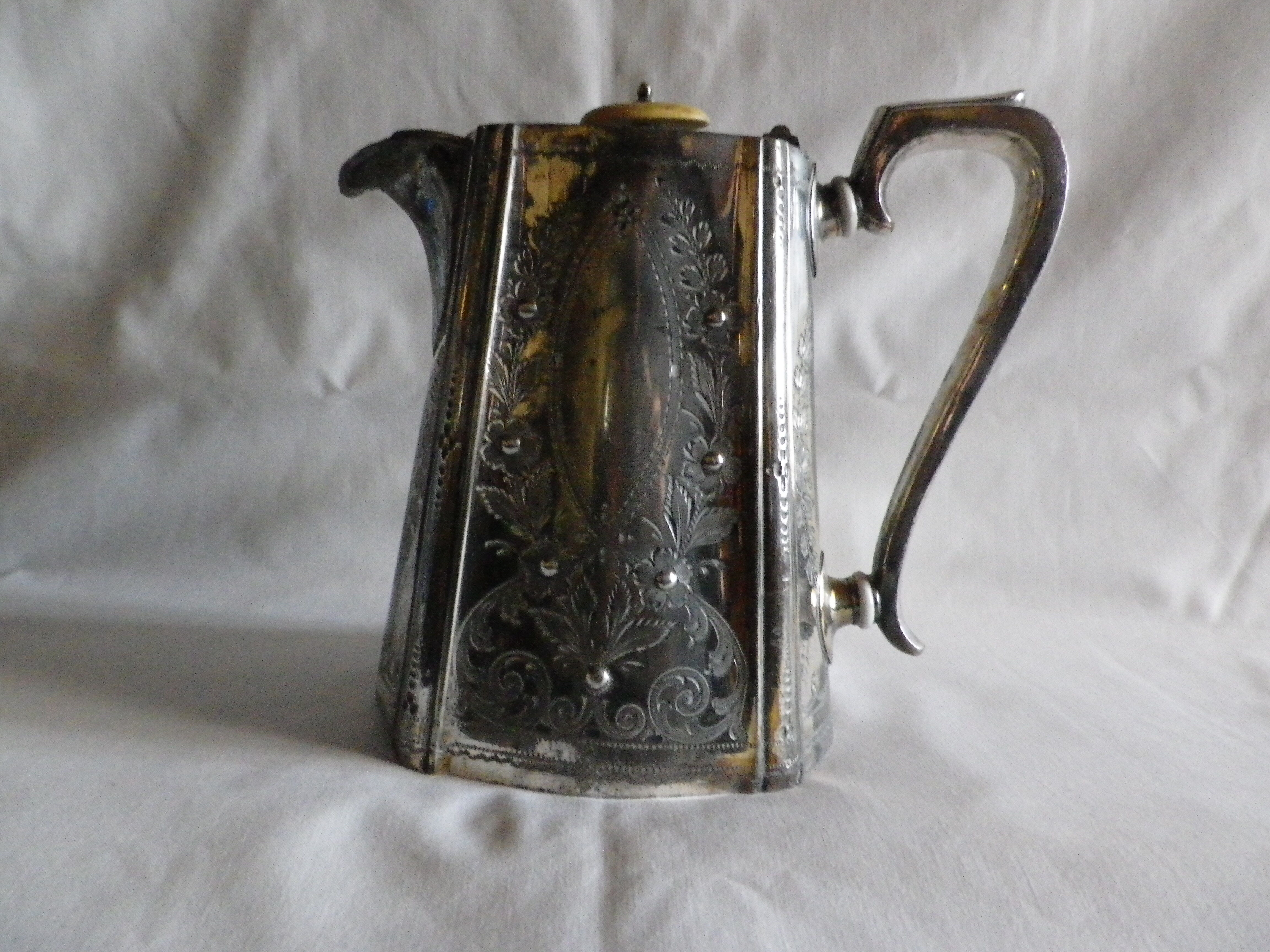 Silver metal coffee pourer