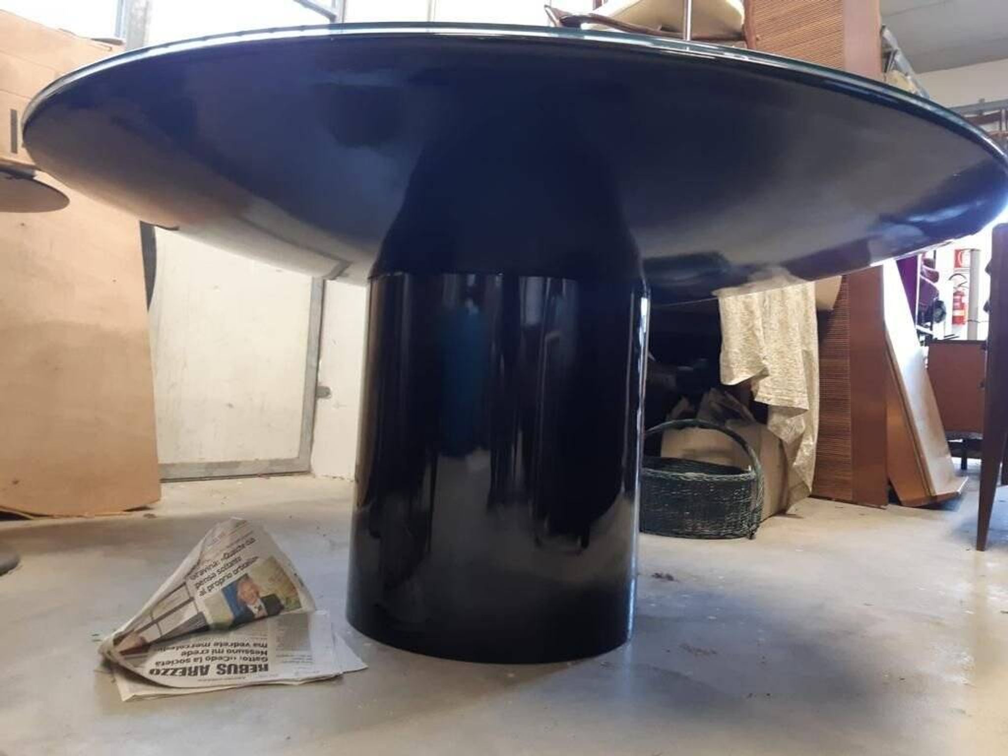 Black lacquered glass table and glass in the hoof style, Italy.
