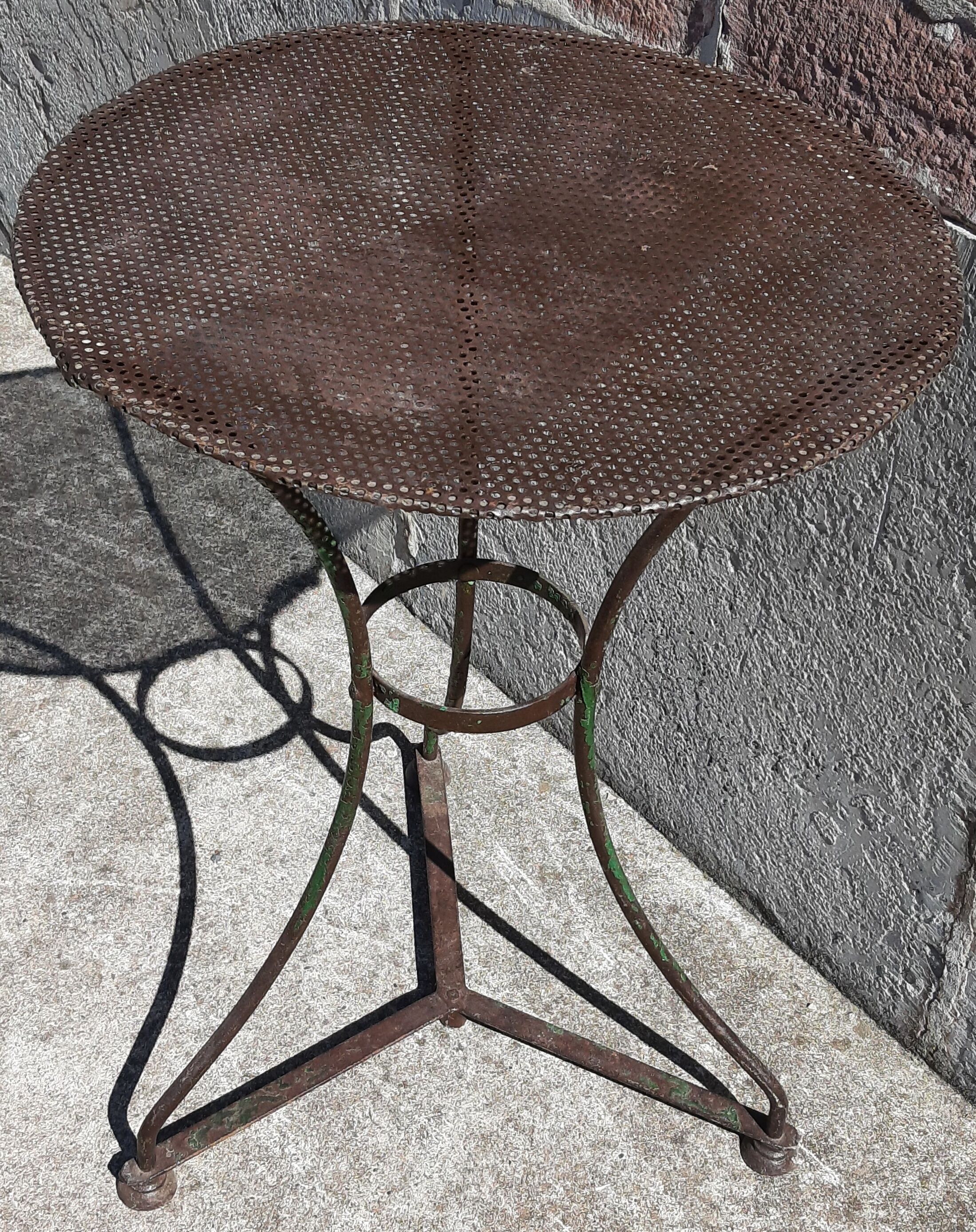 Wrought iron pedestal table