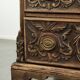 Richly carved English oak chest of drawers from the 18th century