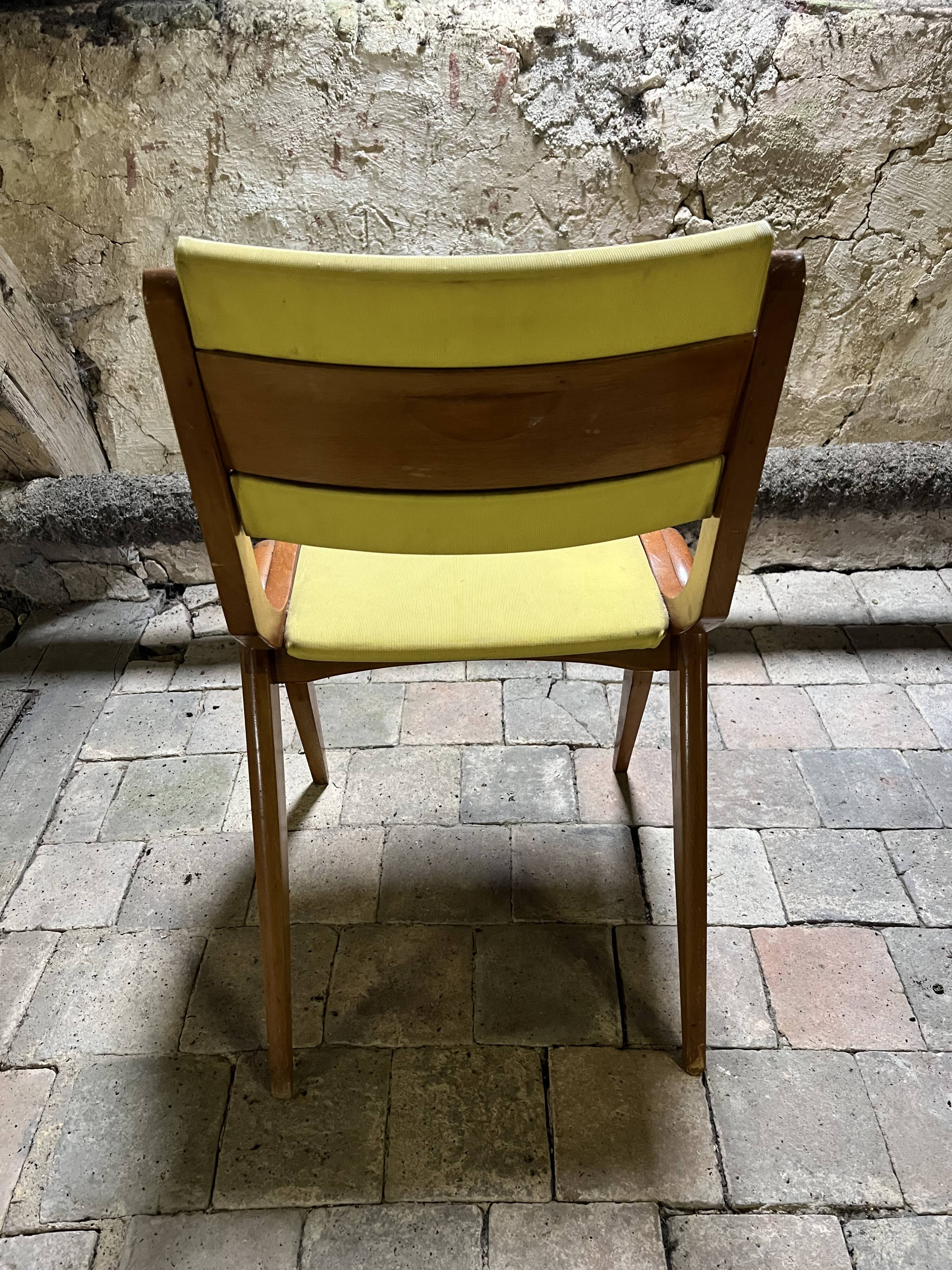 Vintage modernist chair in curved wood and yellow leatherette - 50s/60s