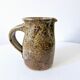 Old pitcher in pyrite stoneware