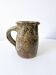 Old pitcher in pyrite stoneware