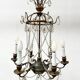 Louis XVI style chandelier with a pearl garland and painted tin, 20th century.