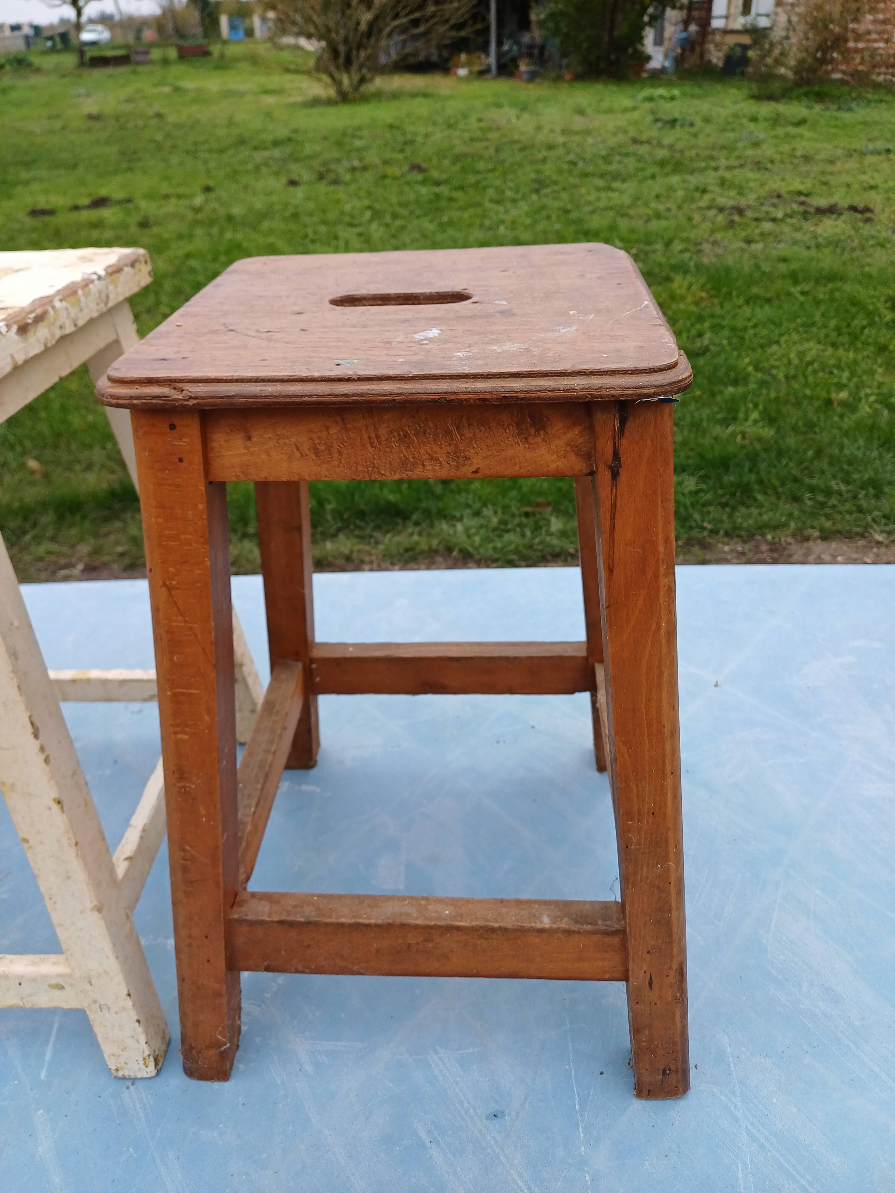 2 wooden workshop stools