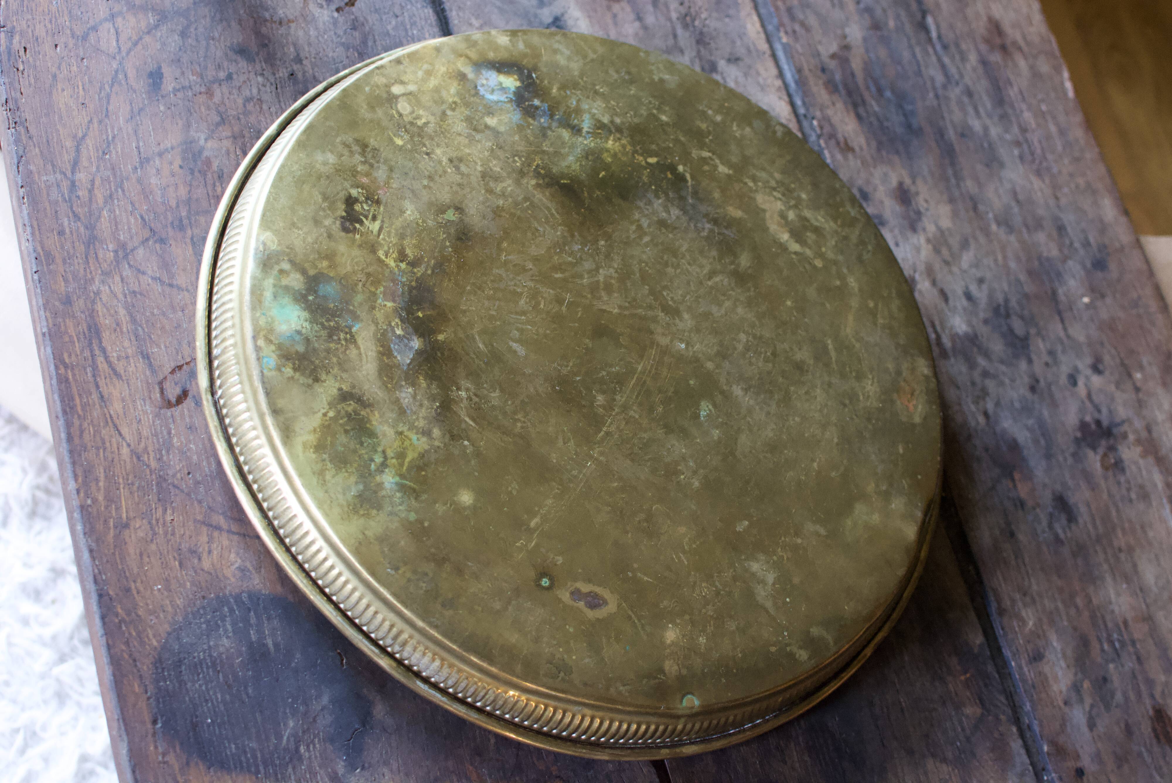 Golden service tray in vintage brass