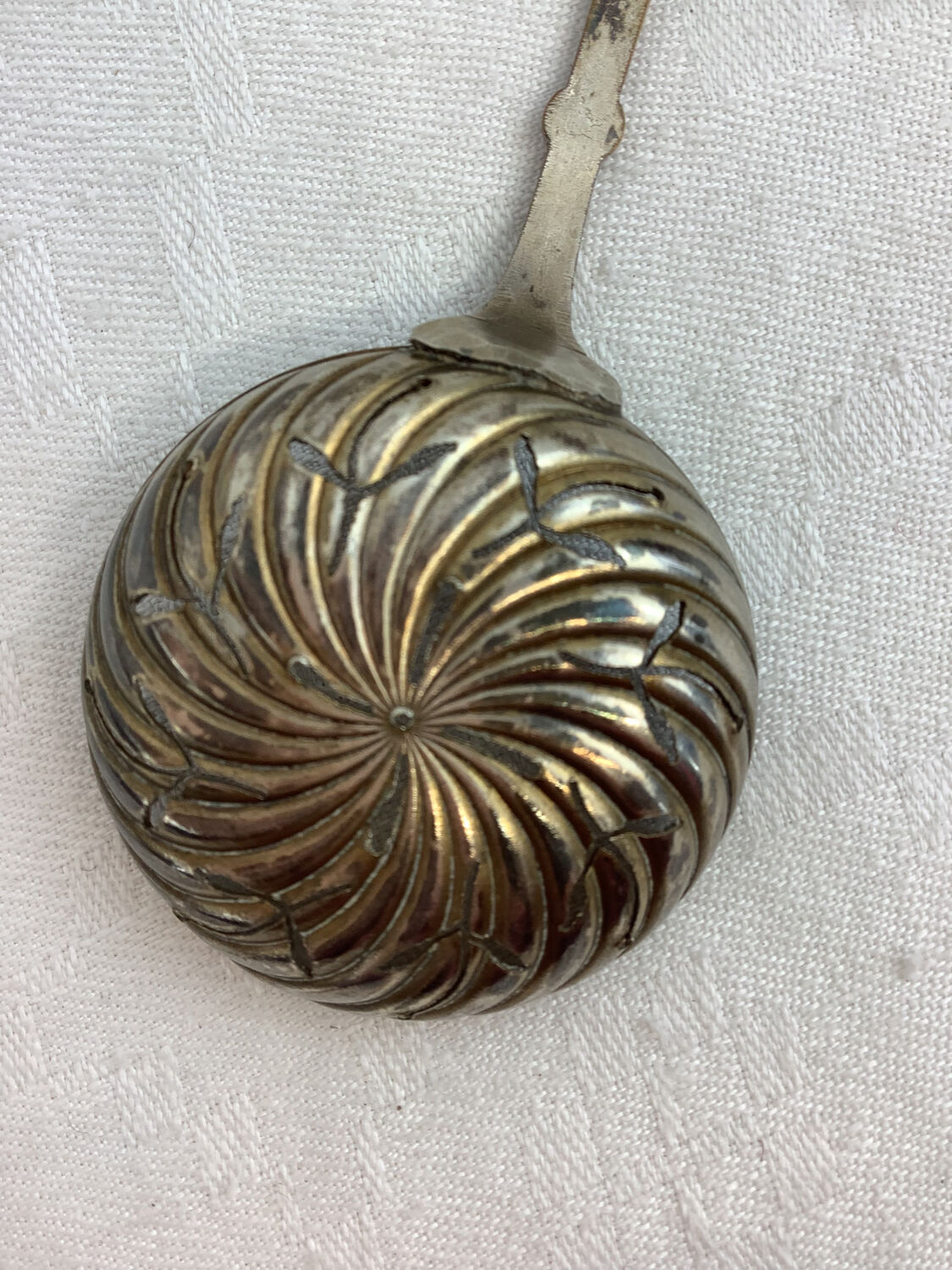 Old sprinkling spoon