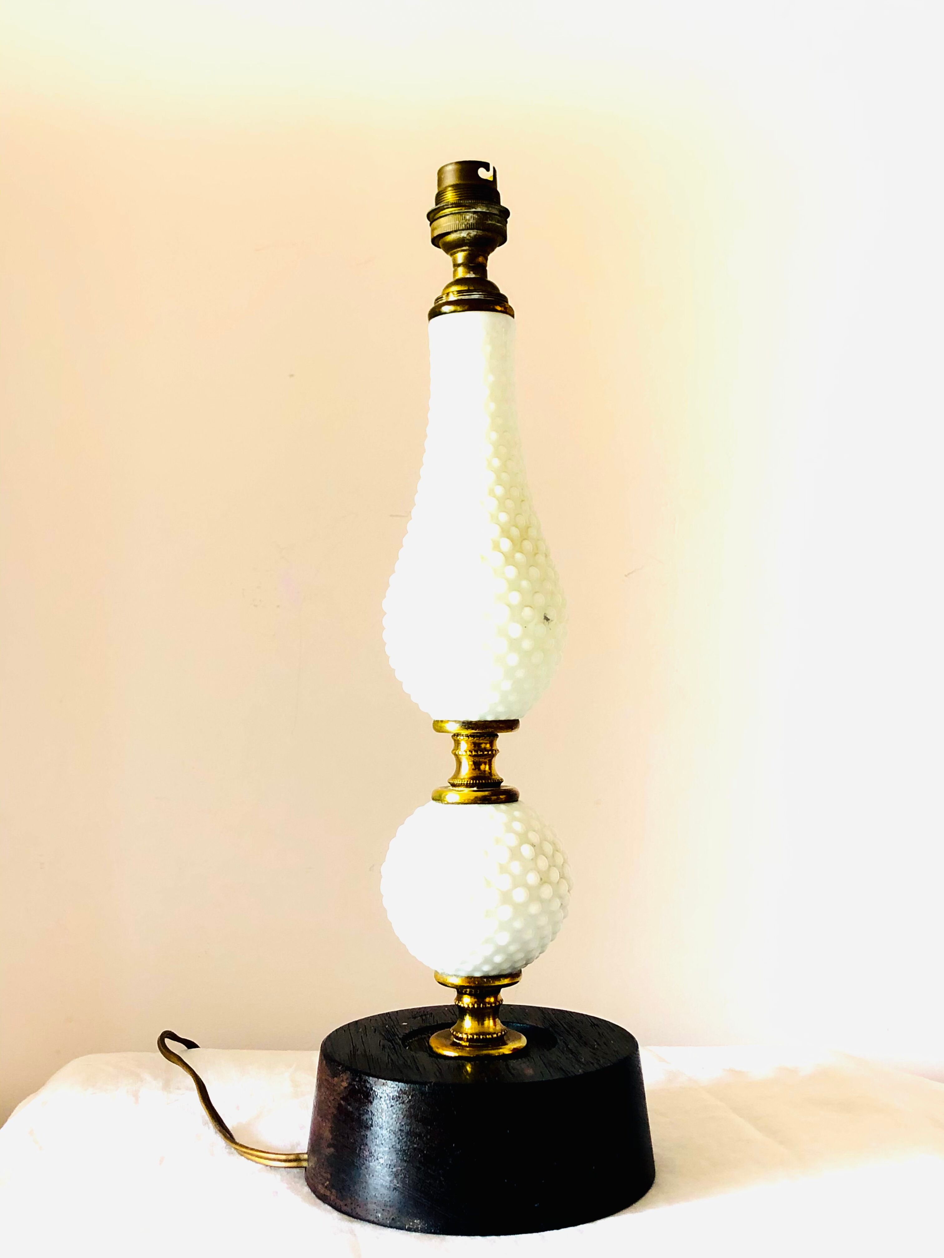 Ebony lamp foot and antique white porcelain