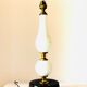 Ebony lamp foot and antique white porcelain
