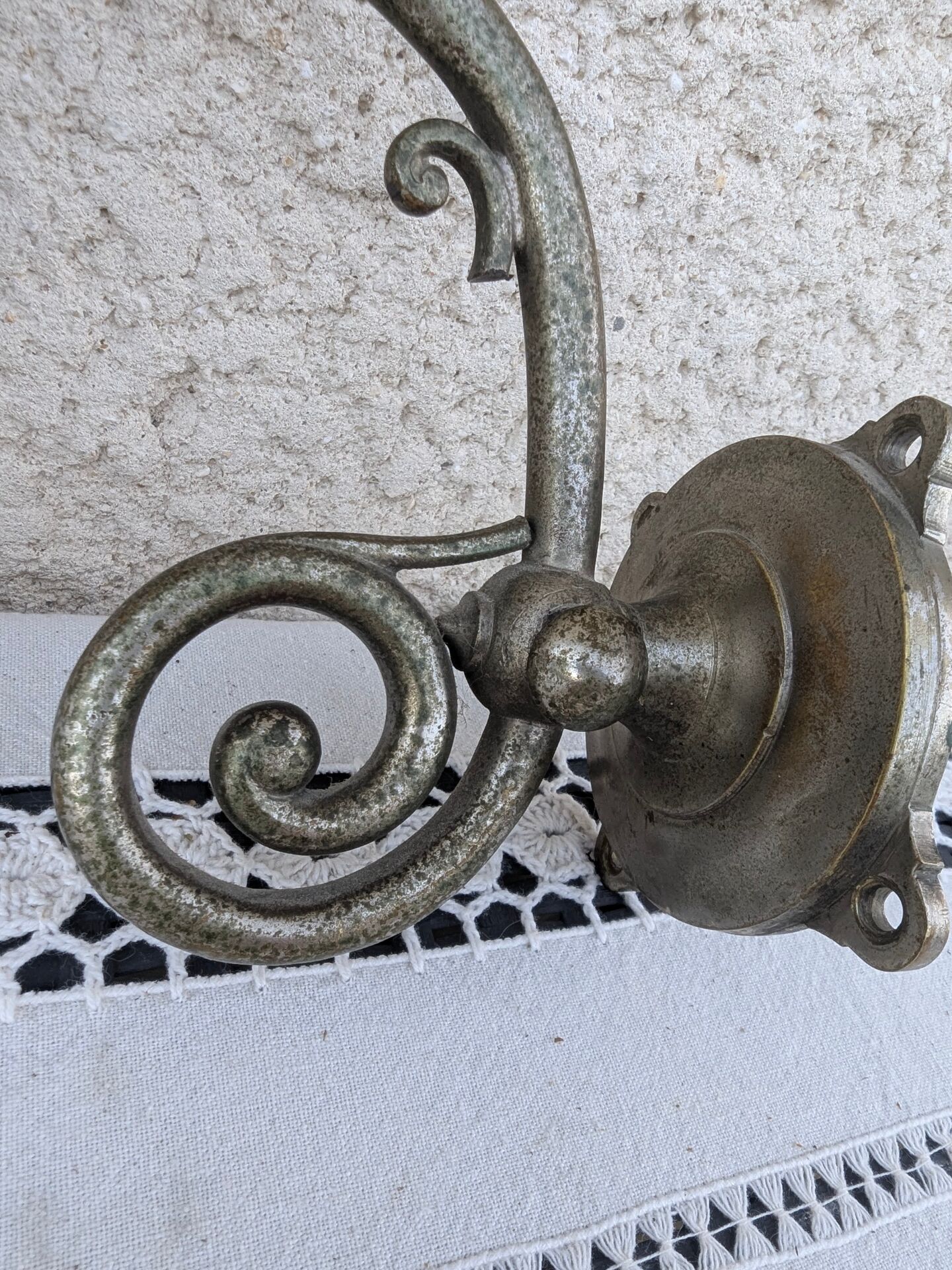 Vintage wall sconce in brass with Holophane glass tulip.