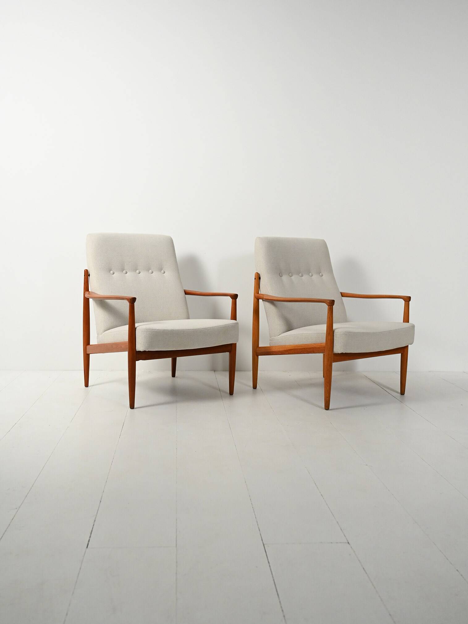 Pair of Scandinavian teak armchairs, 1950s–60s
