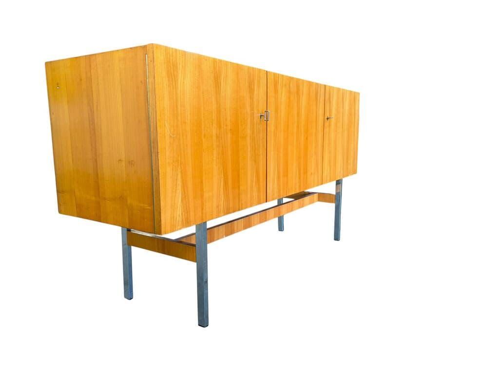 Vintage wooden storage cabinet with chrome legs