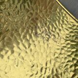 Vintage hammered brass log holder