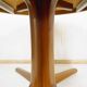 Expandable round teak table