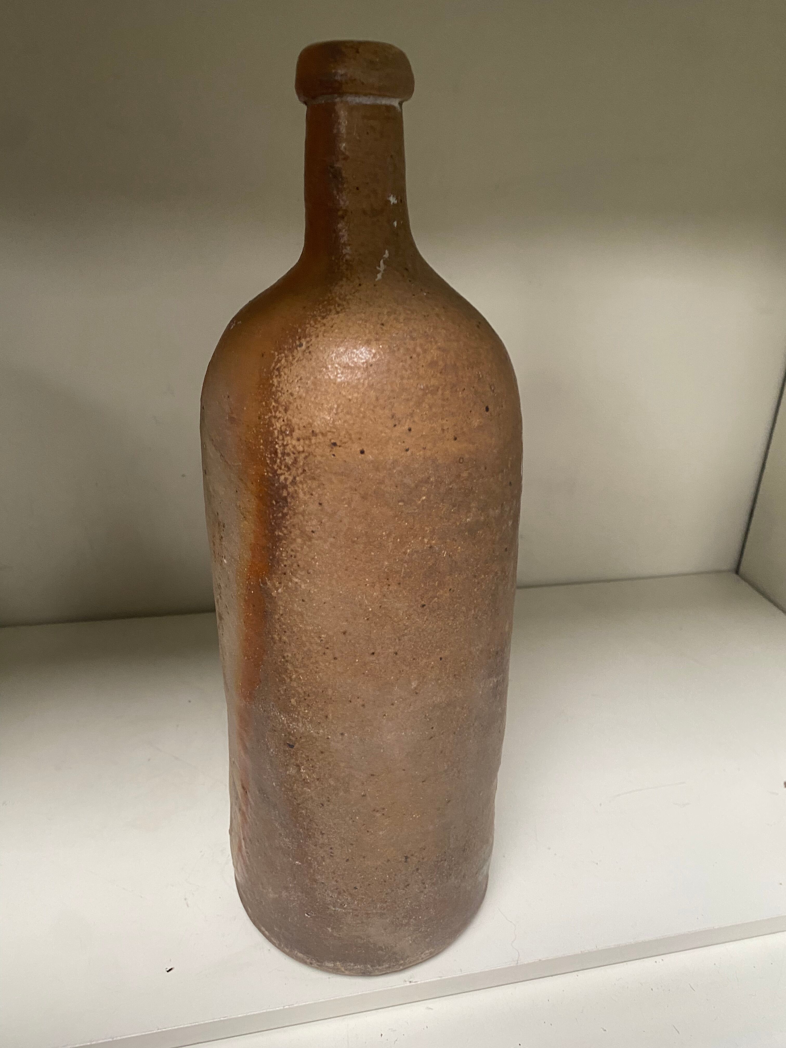 Old sandstone bottle