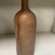 Old sandstone bottle