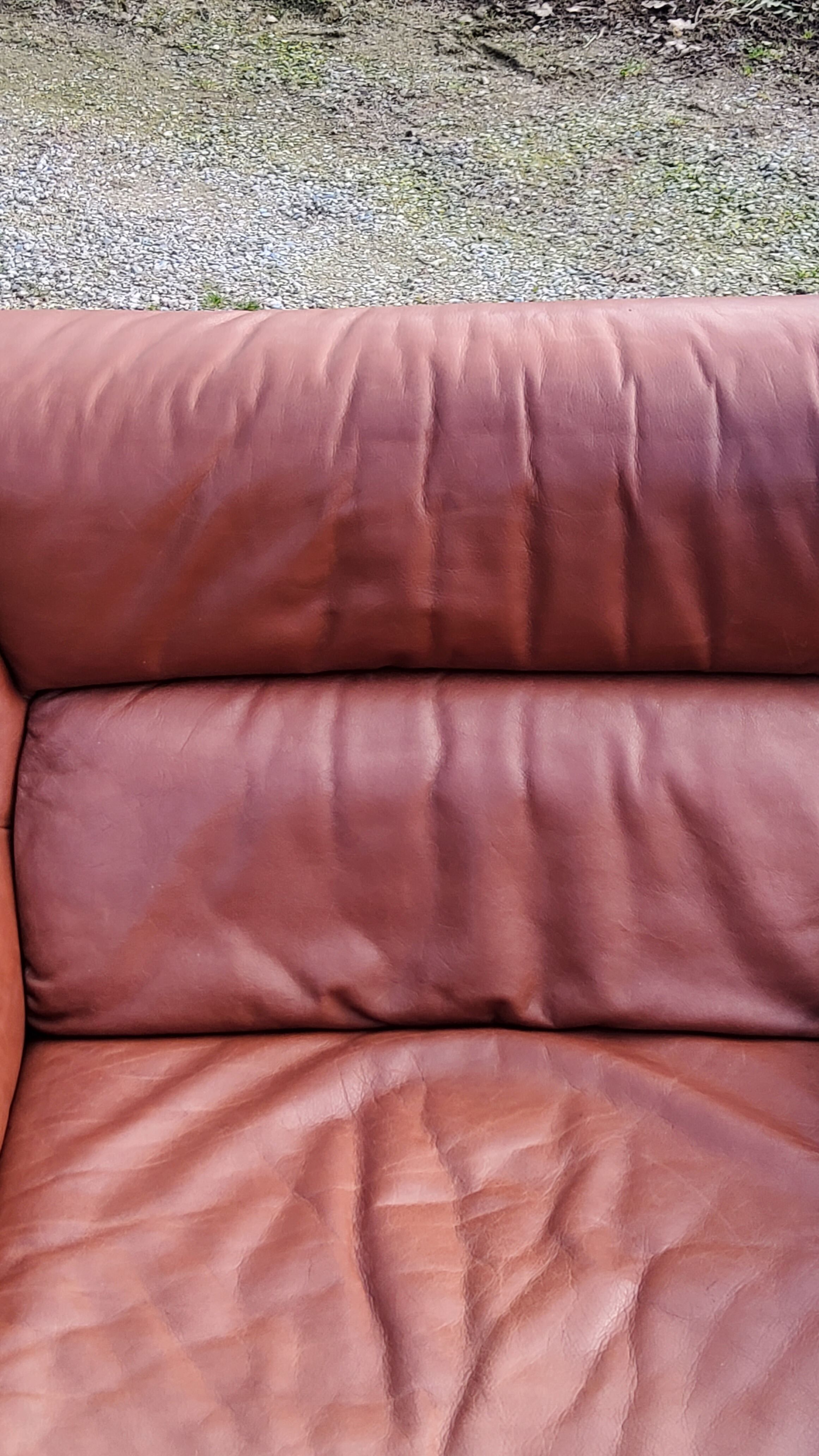 Pair of armchairs and De Sede sofa in cognac leather from the 70s/80s