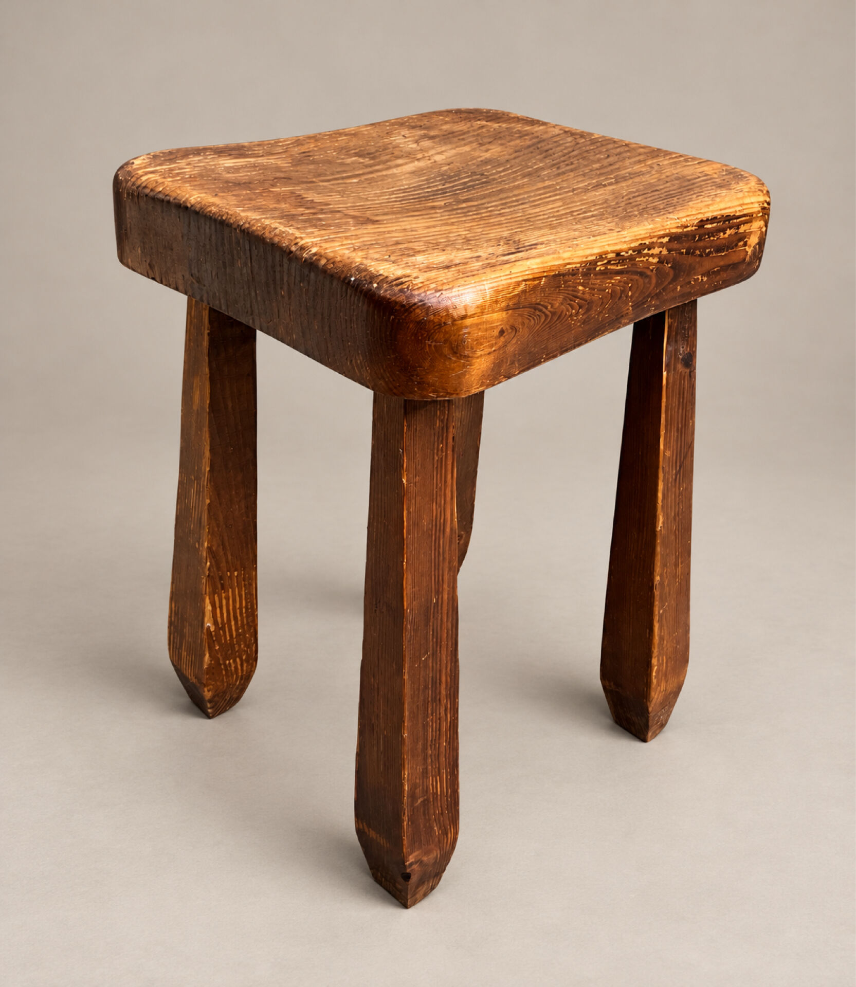 Vintage sculptural solid wood stool, brutalist style.