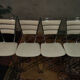 Suite de 4 chaises vintage en skaï
