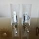 Pair of pull switch wall lights in perspex and gilded brass, France, circa 1960.