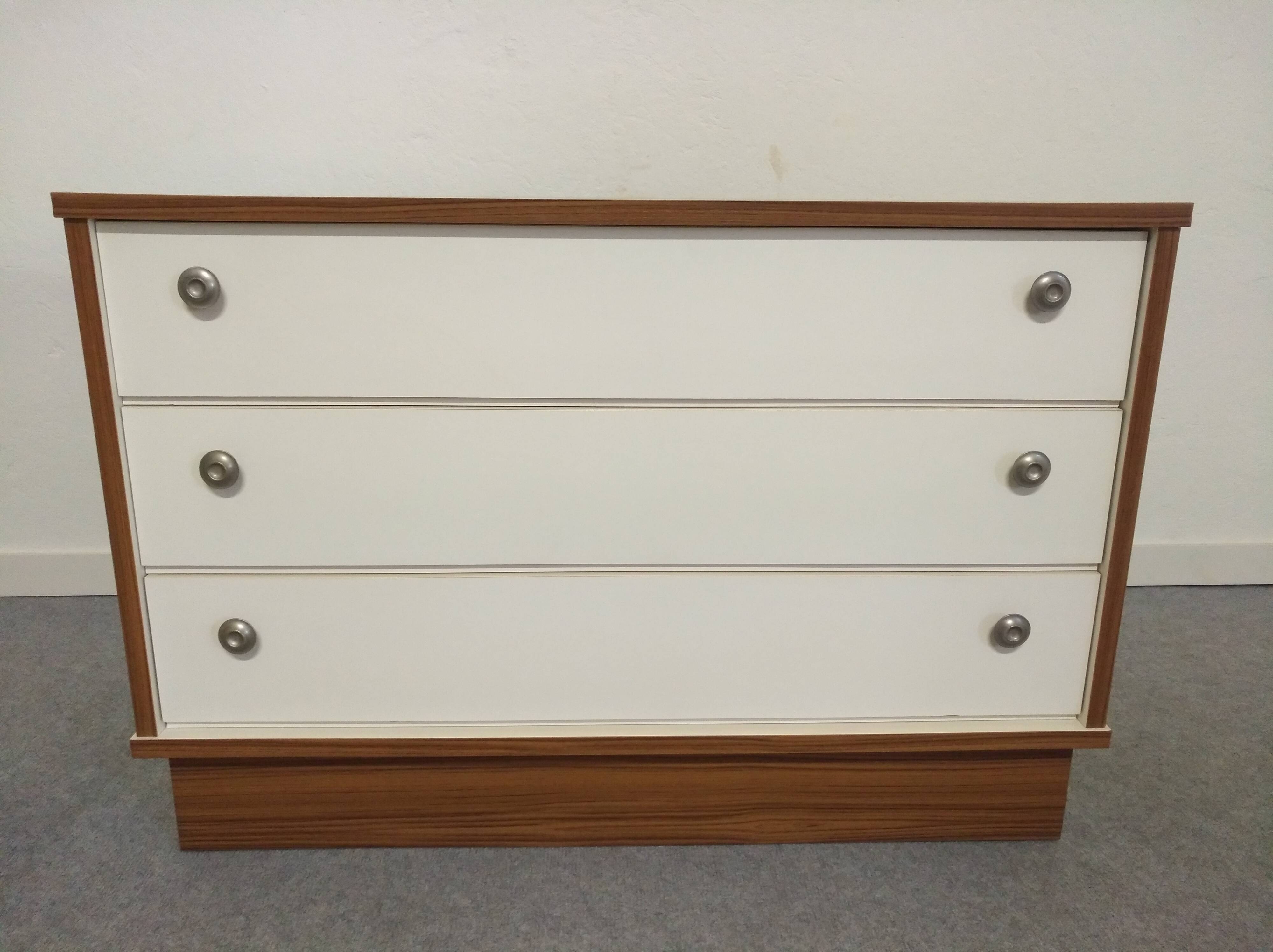 Low chest of drawers with 3 drawers in mahogany and white satin, France circa 1980.