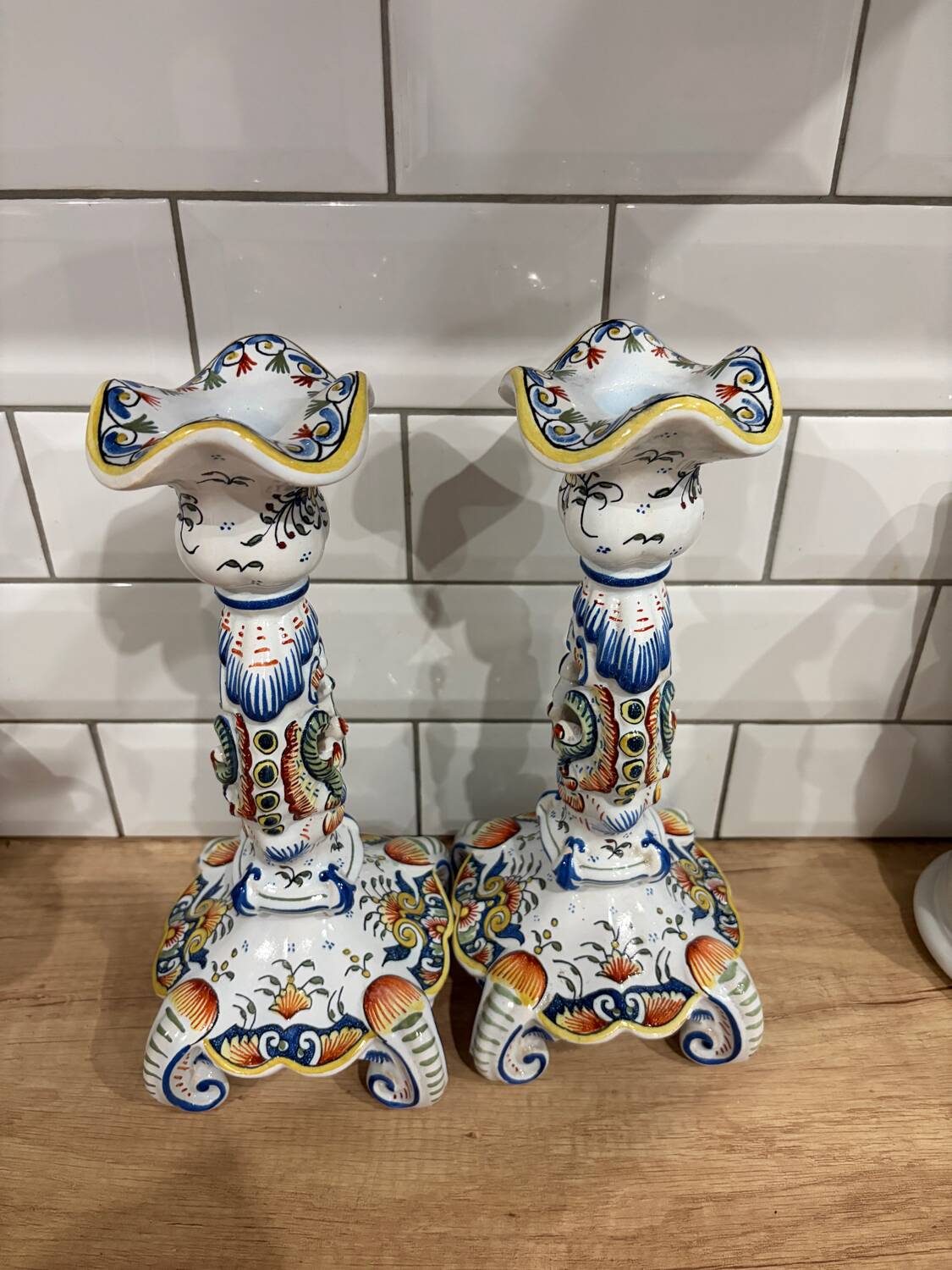 Set of two old Rouen candlesticks.