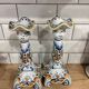 Set of two old Rouen candlesticks.