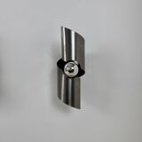 Pair of vintage wall lights, curved patinated steel, France, 1970.