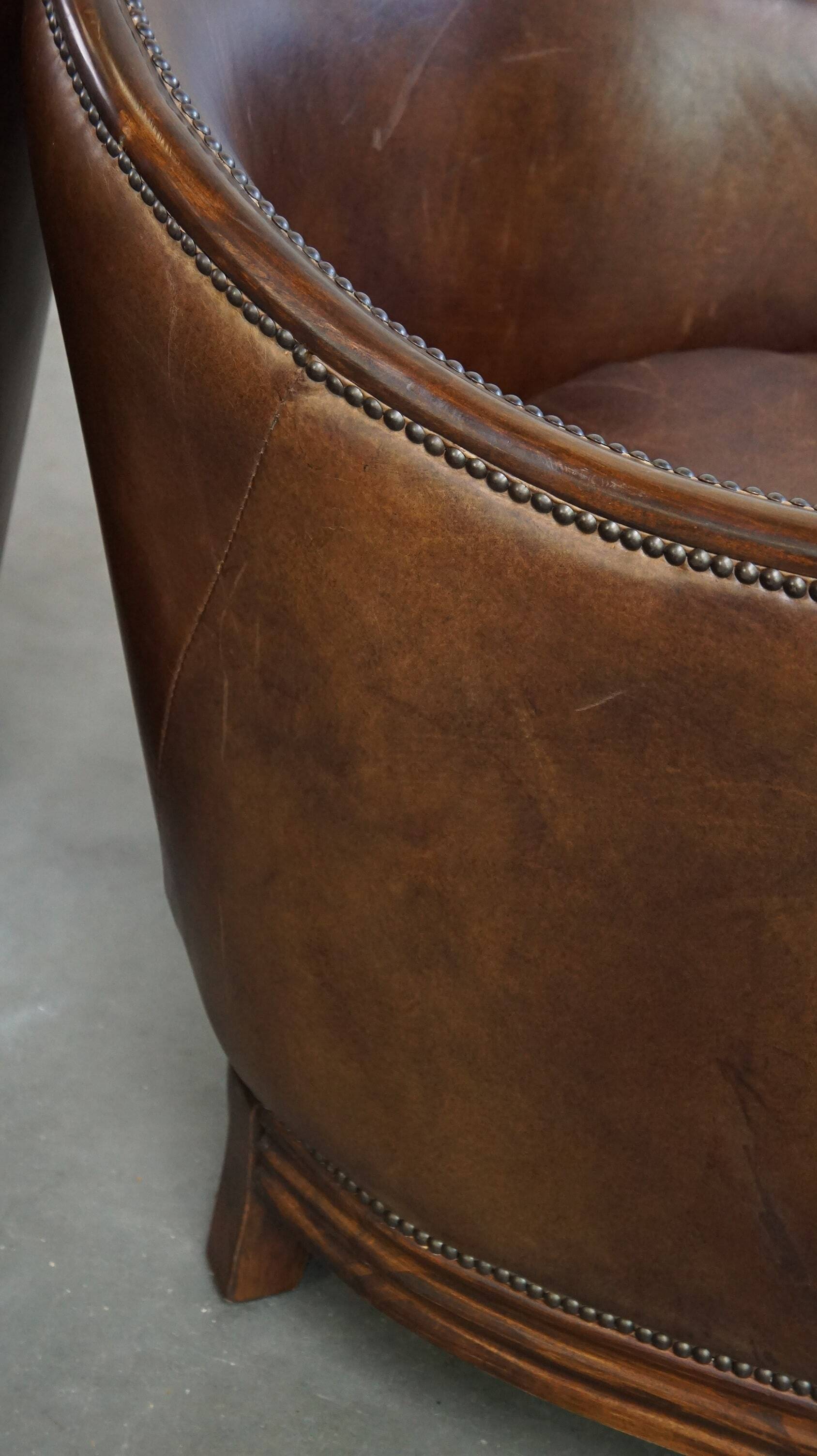 Set of 2 club chairs/armchairs in dark cognac leather
