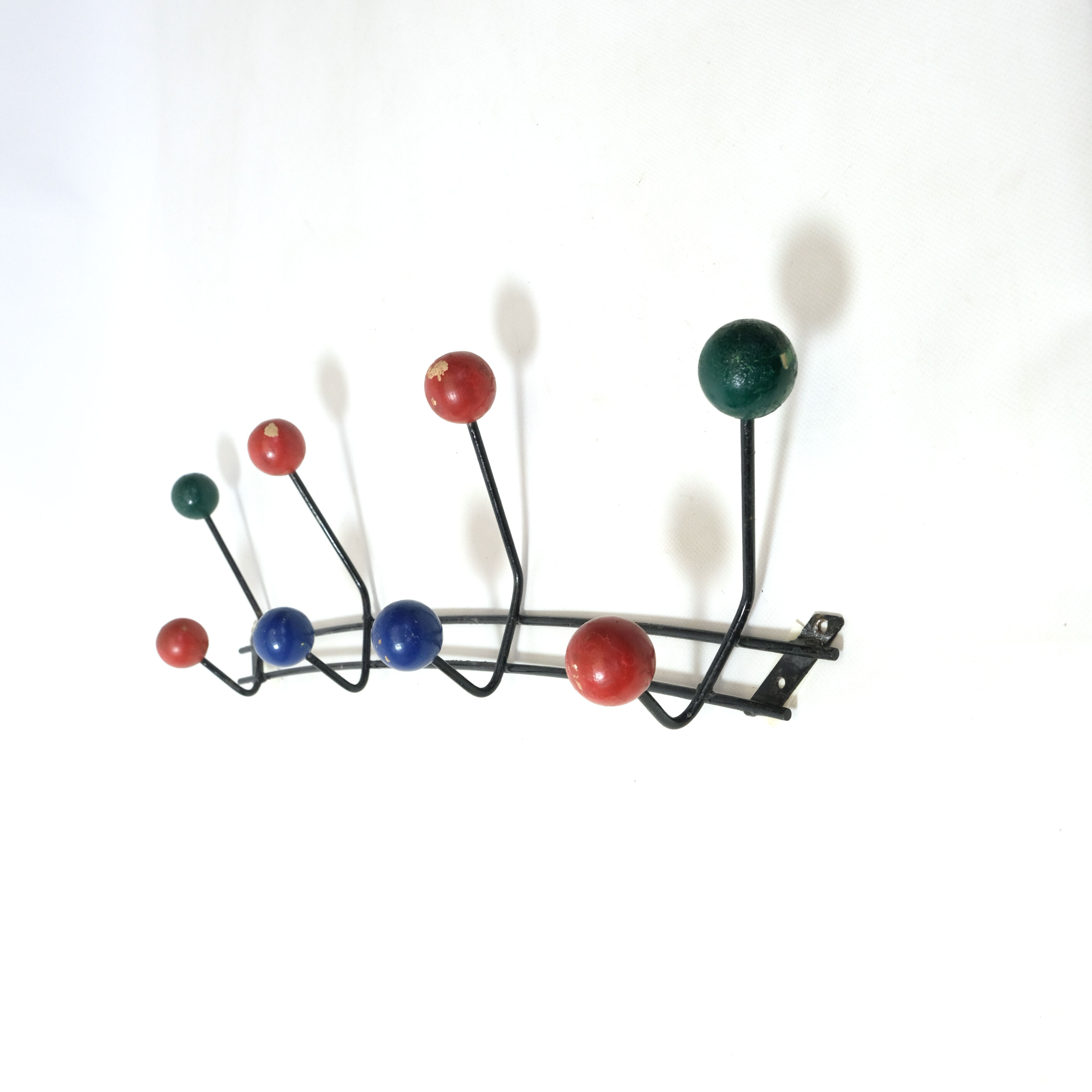 Multicolored wooden and metal coat holder