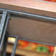 Black metal footing wooden coffee table