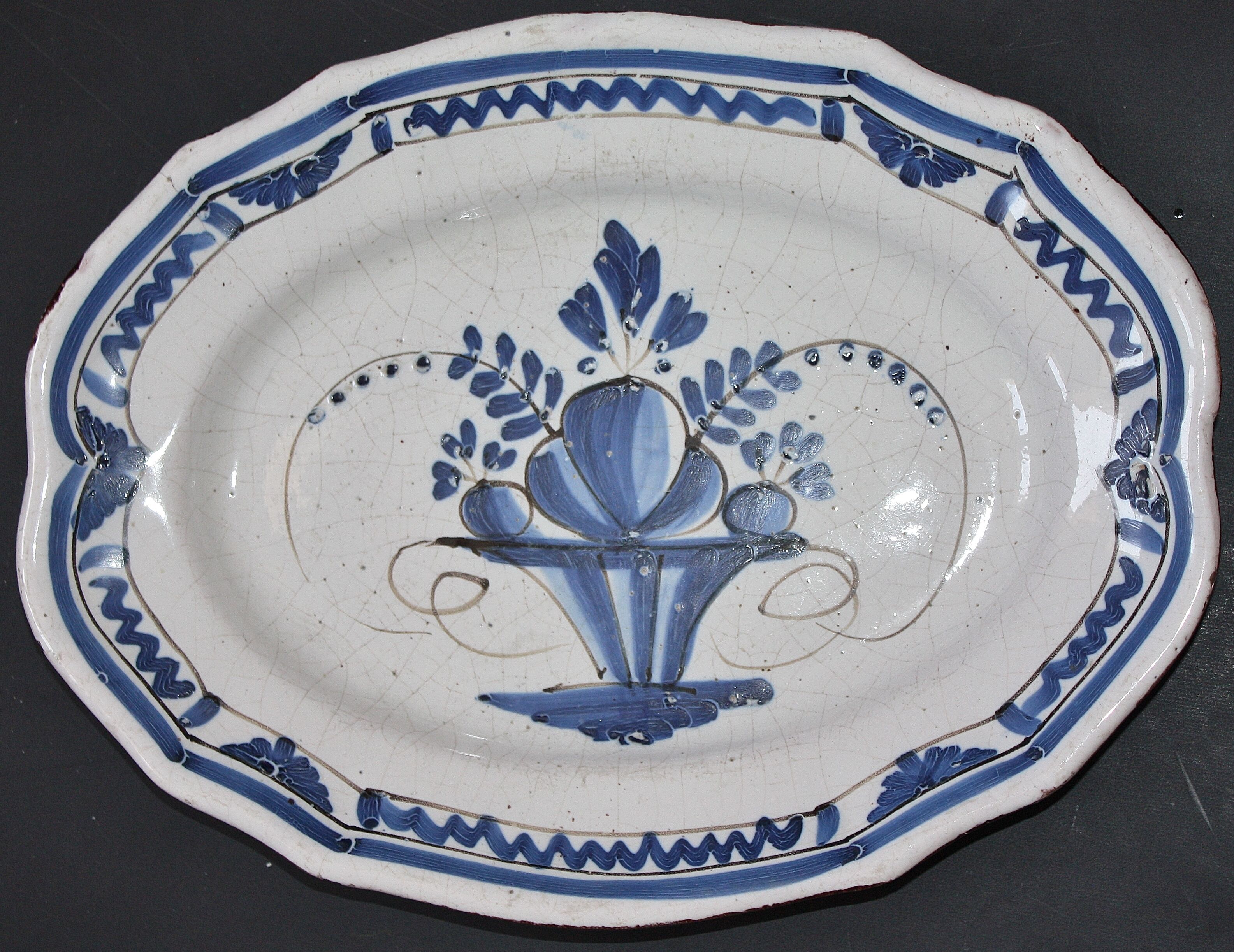 Flat oblong in faience said black ass auxerre