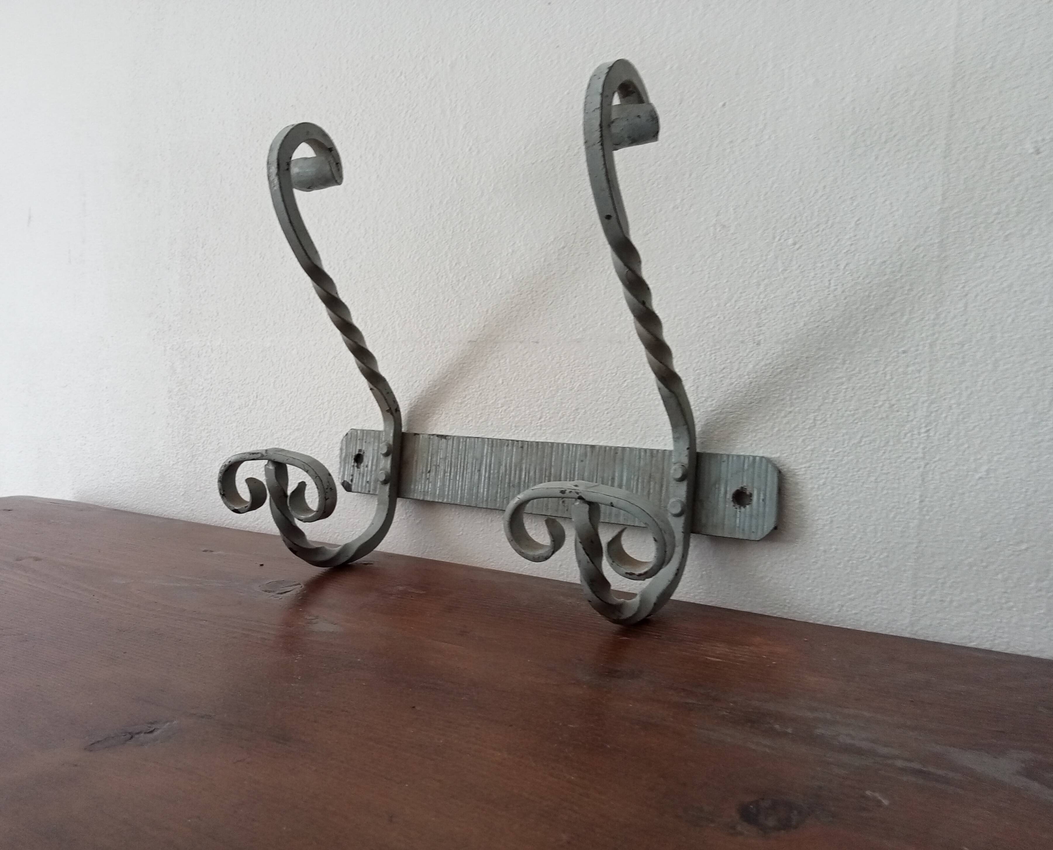 Vintage wrought iron wall coat rack