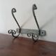 Vintage wrought iron wall coat rack