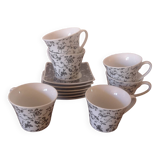 Black and white cups with plates
