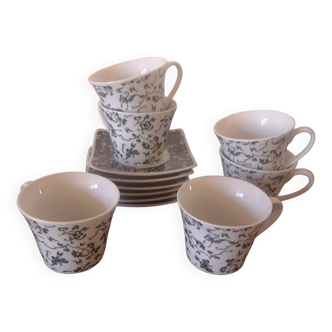 Black and white cups with plates