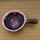 Brown and pink glazed terracotta caquelon