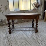 Paneled walnut desk with turned legs, 1900