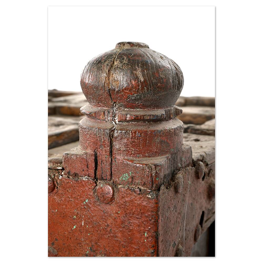 Large wooden and metal chest with red patina