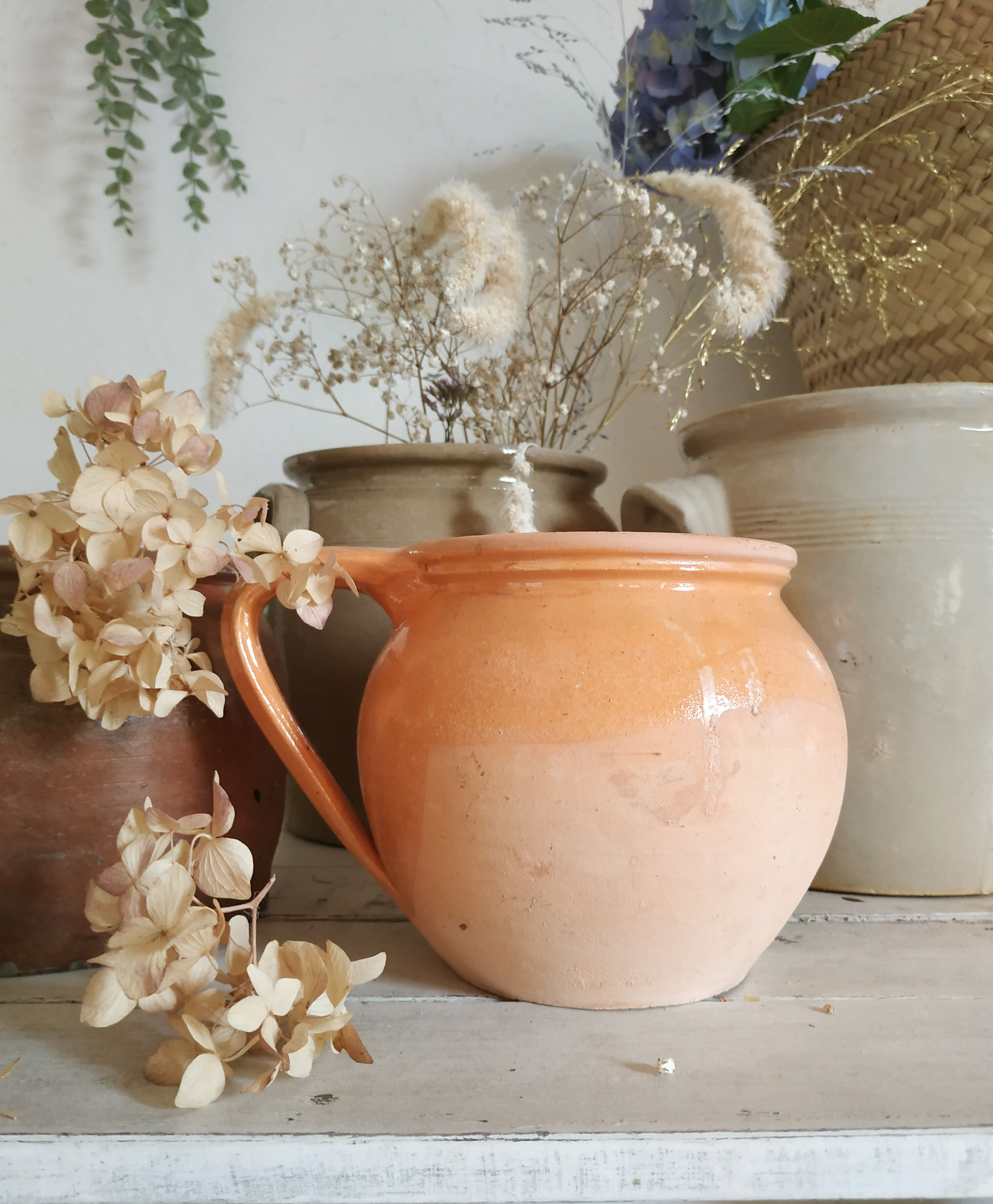 Old terracotta pot glazed ochre color