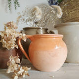 Old terracotta pot glazed ochre color