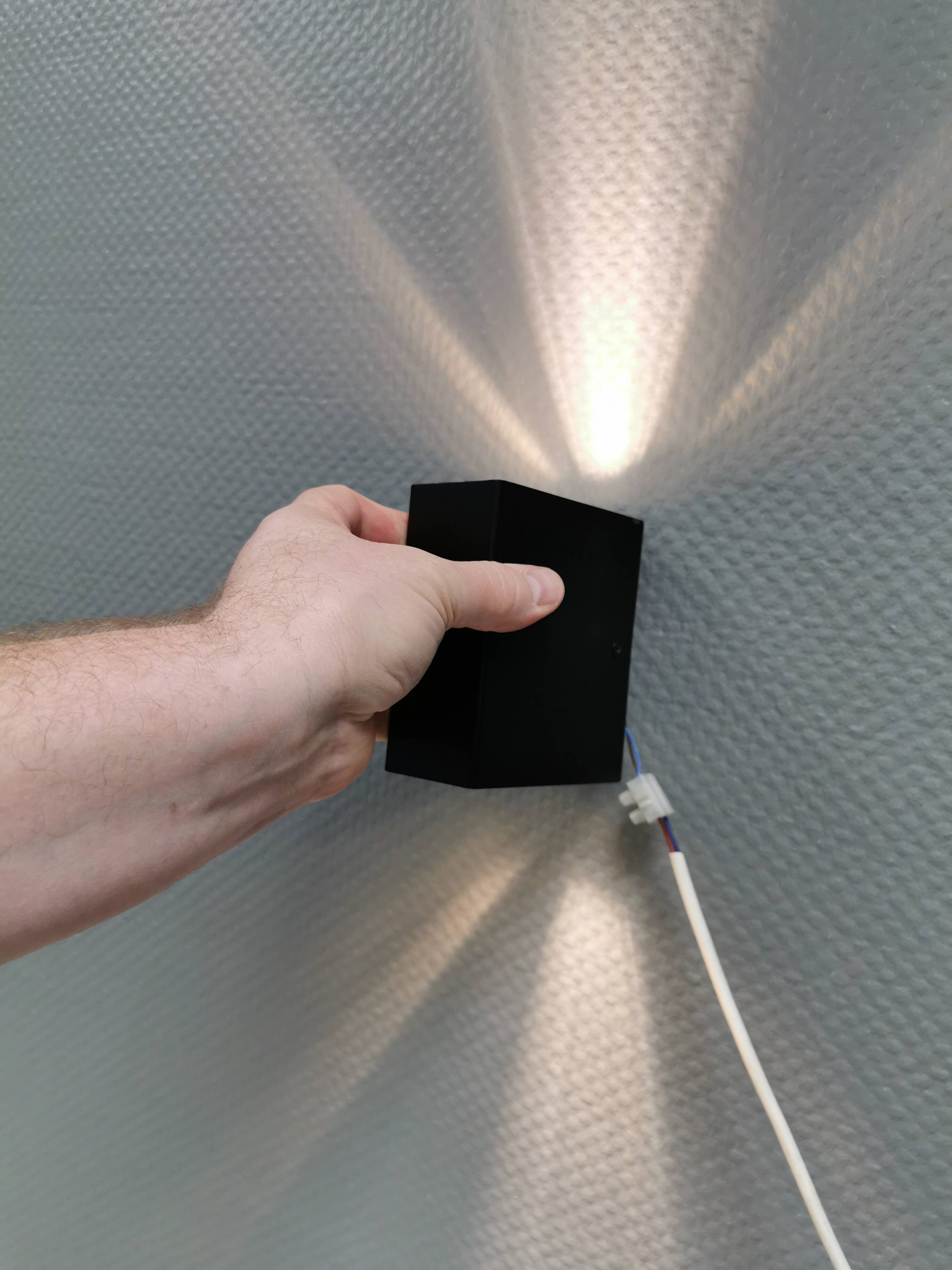 A beautiful up/down wall lamp, designed in Italy in the 1990s.