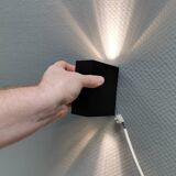 A beautiful up/down wall lamp, designed in Italy in the 1990s.