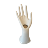 Hand soliflore wearing white ring