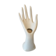 Hand soliflore wearing white ring